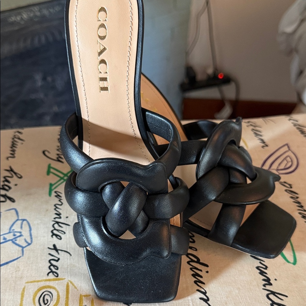 Coach Black Knotted C Heels. 8 M and brand new.